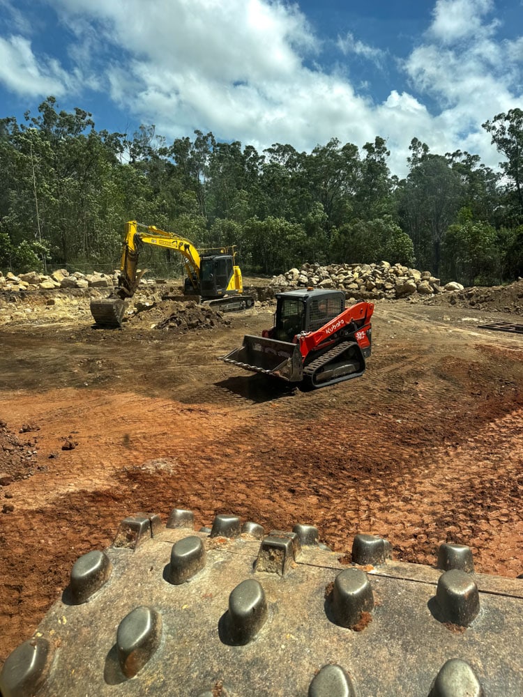Civil contractor Brisbane offering wet hire excavators, bobcats and tipper trucks for earthmoving and site preparation.
